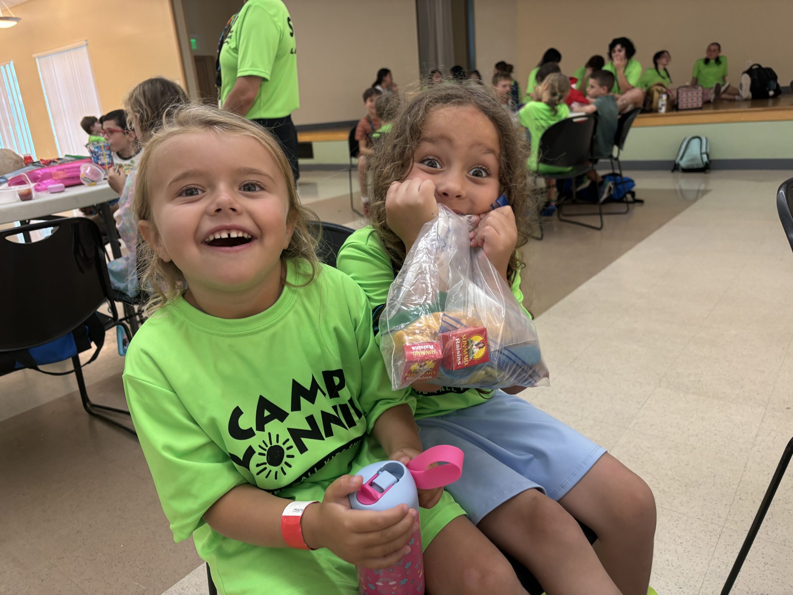 Our Camp Yonnie Director's: Ethan Wolfson and Beth Leinweber. They are standing next to one another smiling toward the camera.